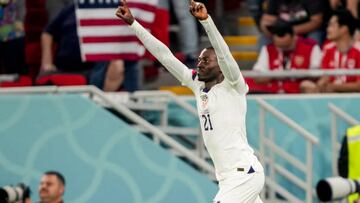 AL RAYYAN, QATAR - NOVEMBER 21: Tim Weah #21 of the United States celebrates his goal during at FIFA World Cup Qatar 2022 Group B match between Wales and USMNT at Ahmad Bin Ali Stadium on November 21, 2022 in Al Rayyan, Qatar. (Photo by John Dorton/ISI Photos/Getty Images)