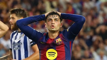 Soccer Football - LaLiga - FC Barcelona v Real Sociedad - Estadi Olimpic Lluis Companys, Barcelona, Spain - September 28, 2025 FC Barcelona's Pedri reacts after he misses a chance to score REUTERS/Albert Gea