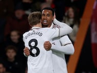 Soccer Football - Premier League - AFC Bournemouth v Arsenal - Vitality Stadium, Bournemouth, Britain - January 3, 2026 Arsenal's Gabriel Magalhaes celebrates scoring their first goal with Martin Odegaard Action Images via Reuters/Andrew Couldridge EDITORIAL USE ONLY. NO USE WITH UNAUTHORIZED AUDIO, VIDEO, DATA, FIXTURE LISTS, CLUB/LEAGUE LOGOS OR 'LIVE' SERVICES. ONLINE IN-MATCH USE LIMITED TO 120 IMAGES, NO VIDEO EMULATION. NO USE IN BETTING, GAMES OR SINGLE CLUB/LEAGUE/PLAYER PUBLICATIONS. PLEASE CONTACT YOUR ACCOUNT REPRESENTATIVE FOR FURTHER DETAILS..