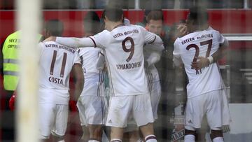 Football Soccer - FC Ingolstadt 04 v Bayern Munich - German Bundesliga - Audi Sportpark, Ingolstadt, Germany - 11/02/17 - Munich's players celebrate. REUTERS/Michael Dalder. DFL RULES TO LIMIT THE ONLINE USAGE DURING MATCH TIME TO 15 PICTURES PER GAME. IMAGE SEQUENCES TO SIMULATE VIDEO IS NOT ALLOWED AT ANY TIME. FOR FURTHER QUERIES PLEASE CONTACT DFL DIRECTLY AT + 49 69 650050
