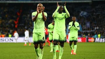 Kompany and Yaya Tour&eacute; applaud the travelling fans in Kiev.