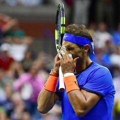Pouille sends Nadal packing as Djokovic eases through