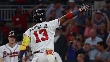 ATLANTA, GEORGIA - SEPTEMBER 26: Ronald Acuna Jr. #13 of the Atlanta Braves reacts as he crosses home plate after hitting a two-run homer in the seventh inning against the Chicago Cubs at Truist Park on September 26, 2023 in Atlanta, Georgia. Kevin C. Cox/Getty Images/AFP (Photo by Kevin C. Cox / GETTY IMAGES NORTH AMERICA / Getty Images via AFP)