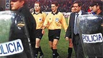 Daudén, escoltado por la Policía.