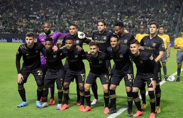 US LAFC players pose for a team picture ahead of the first leg quarterfinal football match of the Concacaf Champions League against Mexico's Leon at Nou Camp stadium in Leon, Guanajuato state, Mexico on February 18, 2020. (Photo by VICTOR CRUZ / AFP)