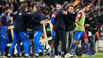 Vicente Moreno y Xavi Hernández.