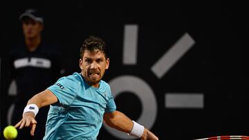 Britain's Cameron Norrie returns the ball during the ATP 500 Rio Open singles tennis final match against Spain's Carlos Alcaraz at the Jockey Club in Rio de Janeiro, Brazil, on February 25, 2023. (Photo by MAURO PIMENTEL / AFP)