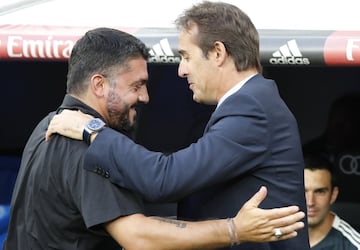 AC Milan coach Gennaro Gattuso (left) is greeted by Real Madrid boss Julen Lopetegui on the touchline.