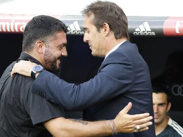 AC Milan coach Gennaro Gattuso (left) is greeted by Real Madrid boss Julen Lopetegui on the touchline.