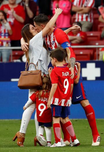 Torres con su familia. 