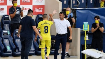 VILLAREAL, SPAIN - JULY 19: Santi Cazorla of Villarreal leaves the pitch and shakes hand with Javier Calleja, Manager of Villarreal after his last match for Villareall during the Liga match between Villarreal CF and SD Eibar SAD at Estadio de la Ceramica