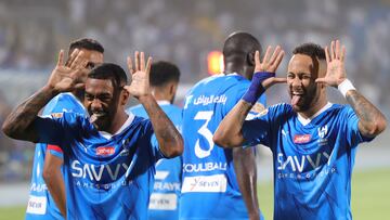 Hilal's Brazilian forward #77 Malcom and Hilal's Brazilian forward #10 Neymar celebrate their team's goal during the Saudi Pro League football match between Al-Hilal and Al-Riyadh at Prince Faisal Bin Fahd Stadium in Riyadh on September 15, 2023. (Photo by Fayez Nureldine / AFP)