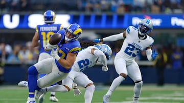 INGLEWOOD, CALIFORNIA - DECEMBER 14: Jacob Saylors #25 of the Detroit Lions hits Davis Allen #87 of the Los Angeles Rams during the first quarter at SoFi Stadium on December 14, 2025 in Inglewood, California. Harry How/Getty Images/AFP (Photo by Harry How / GETTY IMAGES NORTH AMERICA / Getty Images via AFP)