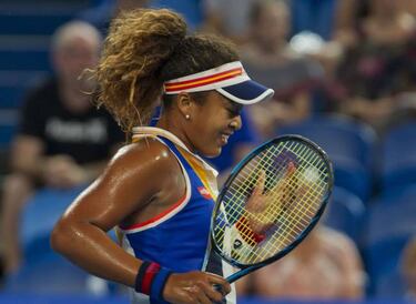 Roger Federer keeps Switzerland rolling at the Hopman Cup