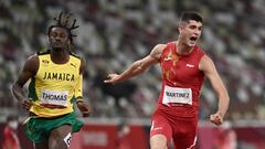 Spain&#039;s Asier Martinez (R) and Jamaica&#039;s Damion Thomas (L) competes in the men&#039;s 110m hurdles heats during the Tokyo 2020 Olympic Games at the Olympic Stadium in Tokyo on August 3, 2021. (Photo by Jewel SAMAD / AFP)