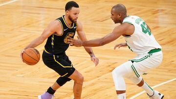 Jun 10, 2022; Boston, Massachusetts, USA; Boston Celtics center Al Horford (42) defends Golden State Warriors guard Stephen Curry (30) during the fourth quarter of game four in the 2022 NBA Finals at the TD Garden. Mandatory Credit: David Butler II-USA TODAY Sports