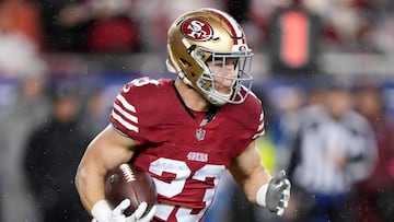 SANTA CLARA, CALIFORNIA - JANUARY 20: Christian McCaffrey #23 of the San Francisco 49ers carries the ball during the first quarter against the Green Bay Packers in the NFC Divisional Playoffs at Levi's Stadium on January 20, 2024 in Santa Clara, California.   Thearon W. Henderson/Getty Images/AFP (Photo by Thearon W. Henderson / GETTY IMAGES NORTH AMERICA / Getty Images via AFP)