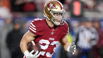 SANTA CLARA, CALIFORNIA - JANUARY 20: Christian McCaffrey #23 of the San Francisco 49ers carries the ball during the first quarter against the Green Bay Packers in the NFC Divisional Playoffs at Levi's Stadium on January 20, 2024 in Santa Clara, California. Thearon W. Henderson/Getty Images/AFP (Photo by Thearon W. Henderson / GETTY IMAGES NORTH AMERICA / Getty Images via AFP)