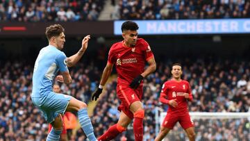 MANCHESTER, ENGLAND - APRIL 10: (THE SUN OUT,THE SUN ON SUNDAY ) Luis Diaz of Liverpool with John Stones of Manchester City during the Premier League match between Manchester City and Liverpool at Etihad Stadium on April 10, 2022 in Manchester, England. (Photo by Andrew Powell/Liverpool FC via Getty Images)