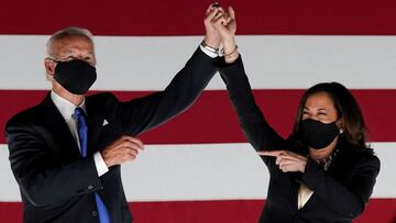 FILE PHOTO: Democratic presidential candidate and former Vice President Joe Biden and U.S. Senator and Democratic candidate for Vice President Kamala Harris celebrate outside the Chase Center after Biden accepted the 2020 Democratic presidential nominatio