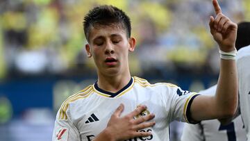 Real Madrid's Turkish midfielder #24 Arda Guler celebrates scoring his team's second goal during the Spanish League football match between Villarreal CF and Real Madrid CF at La Ceramica stadium in Vila-real on May 19, 2024. (Photo by JOSE JORDAN / AFP)