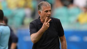 The coach of the Colombian national football team, Portuguese Carlos Queiroz, gestures during the Copa America football tournament group match against Paraguay at the Fonte Nova Arena in Salvador, Brazil, on June 23, 2019. (Photo by Juan Mabromata / AFP)