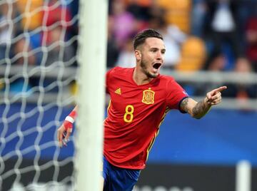 Saúl celebrates his spectacular opening goal for Spain on Saturday night.