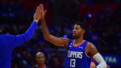 Oct 23, 2022; Los Angeles, California, USA; Los Angeles Clippers guard Paul George (13) is greeted during a time out against the Phoenix Suns in the second half at Crypto.com Arena. Mandatory Credit: Gary A. Vasquez-USA TODAY Sports