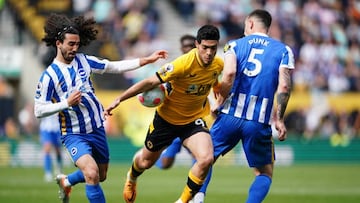 Brighton and Hove Albion's Marc Cucurella, Wolverhampton Wanderers' Raul Jimenez and Brighton and Hove Albion's Lewis Dunk (right) battle for the ball during the Premier League match at Molineux Stadium, Wolverhampton. Picture date: Saturday April 30, 2022. (Photo by Zac Goodwin/PA Images via Getty Images)