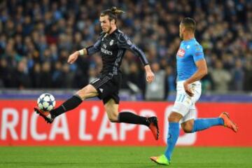 Bale leaps to bring down a pass on his left foot.