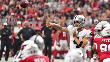 Aug 15, 2019; Glendale, AZ, USA; Oakland Raiders quarterback Derek Carr (4) throws a touchdown pass against the Arizona Cardinals during the first half during a preseason game at State Farm Stadium. Mandatory Credit: Matt Kartozian-USA TODAY Sports