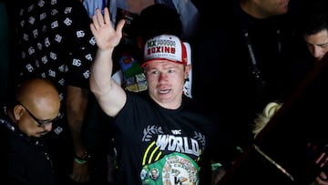 Mexican boxer Saul "Canelo" Alvarez celebrates his victory against British boxer John Ryder after their boxing match for the WBA, WBC, IBF and WBO super middleweight titles at Akron Stadium in Guadalajara, Jalisco State, Mexico on May 6, 2023. (Photo by ULISES RUIZ / AFP)