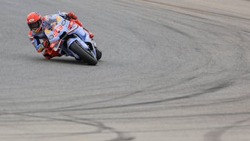 Ducati Spanish rider Marc Marquez takes part in the MotoGP first free practice session of the Portuguese Grand Prix at the Algarve International Circuit in Portimao on March 22, 2024. (Photo by PATRICIA DE MELO MOREIRA / AFP)