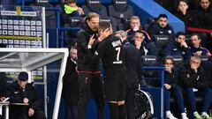 Paris Saint-Germain&#039;s French forward Kylian Mbappe (R) speaks with Paris Saint-Germain&#039;s German coach Thomas Tuchel as he leaves the pitch during the French L1 football match between Paris Saint-Germain (PSG) and Montpellier Herault SC at the Pa