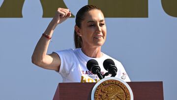 Mexico's President Claudia Sheinbaum gestures as she delivers a speech during the inauguration of the National Boxing Class being held simultaneously in the country, promoted by the government to combat drug addiction and violence, in Mexico City on April 6, 2025. (Photo by Yuri CORTEZ / AFP)