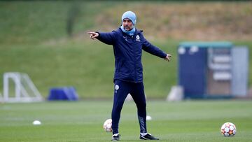 Soccer Football - Champions League - Manchester City Training - Manchester, Britain - April 4, 2022 Manchester City manager Pep Guardiola during training REUTERS/Craig Brough