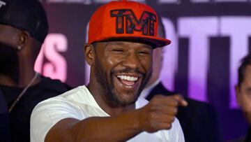US boxer Floyd Mayweather Jr. gestures during the weighing ceremony for his upcoming exhibition fight against John Gutti III in Mexico City on August 23, 2024. Mayweather Jr. and Gotti III will face each other in an exhibition fight in Mexico on August 24, 2024. (Photo by ALFREDO ESTRELLA / AFP)