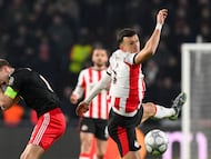 Bayern Munich's German midfielder #06 Joshua Kimmich reacts next to PSV Eindhoven's Croatian forward #05 Ivan Perisic during the UEFA Champions League league phase day 8 football match between PSV Eindhoven and Bayern Munich at Philips Stadion in Eindhoven on January 28, 2026. (Photo by JOHN THYS / AFP)
