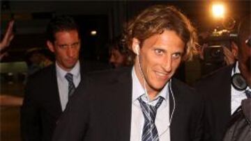 <b>Diego Forlán</b>, de regreso a Madrid desde Liverpool.