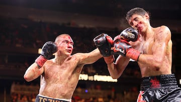 LAS VEGAS, NEVADA - MARCH 30: WBO junior middleweight champion Tim Tszyu (L) connects with a punch on Sebastian Fundora during the ninth round of a title fight at T-Mobile Arena on March 30, 2024 in Las Vegas, Nevada. Fundora won Tszyu's title and a vacant WBC title by split decision.   Steve Marcus/Getty Images/AFP (Photo by Steve Marcus / GETTY IMAGES NORTH AMERICA / Getty Images via AFP)