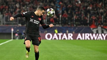 Bayer Leverkusen's Spanish defender #21 Lucas Vazquez controls the ball during the UEFA Champions League knockout round play-off first leg football match between Olympiacos FC (GRE) and Bayer Leverkusen (GER) at the Karaiskakis Stadium in Piraeus, near Athens, on February 18, 2026. (Photo by Aris MESSINIS / AFP)