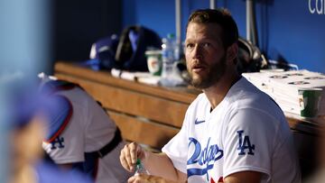 LOS ANGELES, CALIFORNIA - APRIL 30: Clayton Kershaw #22 of the Los Angeles Dodgers looks on from the dugout after becoming the Los Angeles Dodgers all-time strikeout Leader during the fourth inning against the Detroit Tigers at Dodger Stadium on April 30, 2022 in Los Angeles, California.   Katelyn Mulcahy/Getty Images/AFP
== FOR NEWSPAPERS, INTERNET, TELCOS & TELEVISION USE ONLY ==