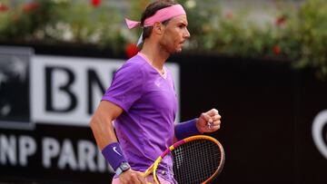 ROME, ITALY - MAY 12: Rafael Nadal of Spain celebrates a point on day 5 of the Internazionali BNL d&rsquo;Italia match between Rafael Nadal of Spain and Jannik Sinner of Italy at Foro Italico on May 12, 2021 in Rome, Italy. Sporting stadiums around Italy remain under strict restrictions due to the Coronavirus Pandemic as Government social distancing laws prohibit fans inside venues resulting in games being played behind closed doors. (Photo by Clive Brunskill/Getty Images)