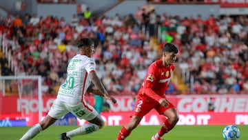 Agustin Almedra (L) of Necaxa fights for the ball with Diego Barbosa (R) of Necaxa during the 10th round match between Necaxa and Toluca as part of the Liga BBVA MX Varonil, Torneo Clausura 2026 at Victoria Stadium, on February 21, 2026 in Aguascalientes, Mexico.