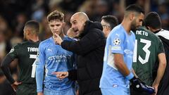 Manchester City&#039;s Spanish manager Pep Guardiola gives instructions to Manchester City&#039;s English midfielder James McAtee during the UEFA Champions League round of 16 second leg football match between Manchester City and Sporting Lisbon at the Eti