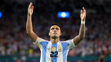 Argentina's forward #22 Lautaro Martinez celebrates scoring his team's first goal during the Conmebol 2024 Copa America tournament group A football match between Argentina and Peru at Hard Rock Stadium in Miami, Florida on June 29, 2024. (Photo by Chris ARJOON / AFP)