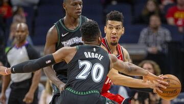 Apr 9, 2019; Minneapolis, MN, USA; Toronto Raptors guard Danny Green (14) looks to pass the ball around Minnesota Timberwolves guard Josh Okogie (20) after stealing the ball in the first half at Target Center. Mandatory Credit: Jesse Johnson-USA TODAY Sports