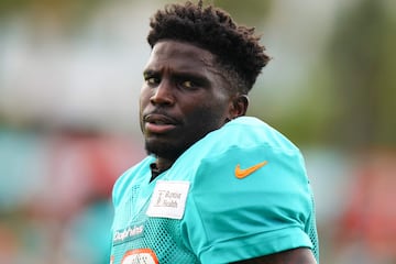 MIAMI GARDENS, FLORIDA - AUGUST 07: Tyreek Hill #10 of the Miami Dolphins looks on during training camp practice with the Atlanta Falcons on August 07, 2024 in Miami Gardens, Florida.   Rich Storry/Getty Images/AFP (Photo by Rich Storry / GETTY IMAGES NORTH AMERICA / Getty Images via AFP)