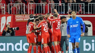 Bayern Munich's players celebrates after the 3-0 goal during the German first division Bundesliga football match between FC Bayern Munich and Bayer Leverkusen in Munich, southern Germany on November 1, 2025. (Photo by Alexandra BEIER / AFP) / DFL REGULATIONS PROHIBIT ANY USE OF PHOTOGRAPHS AS IMAGE SEQUENCES AND/OR QUASI-VIDEO