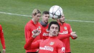 Savic entrenándose hoy con el grupo.